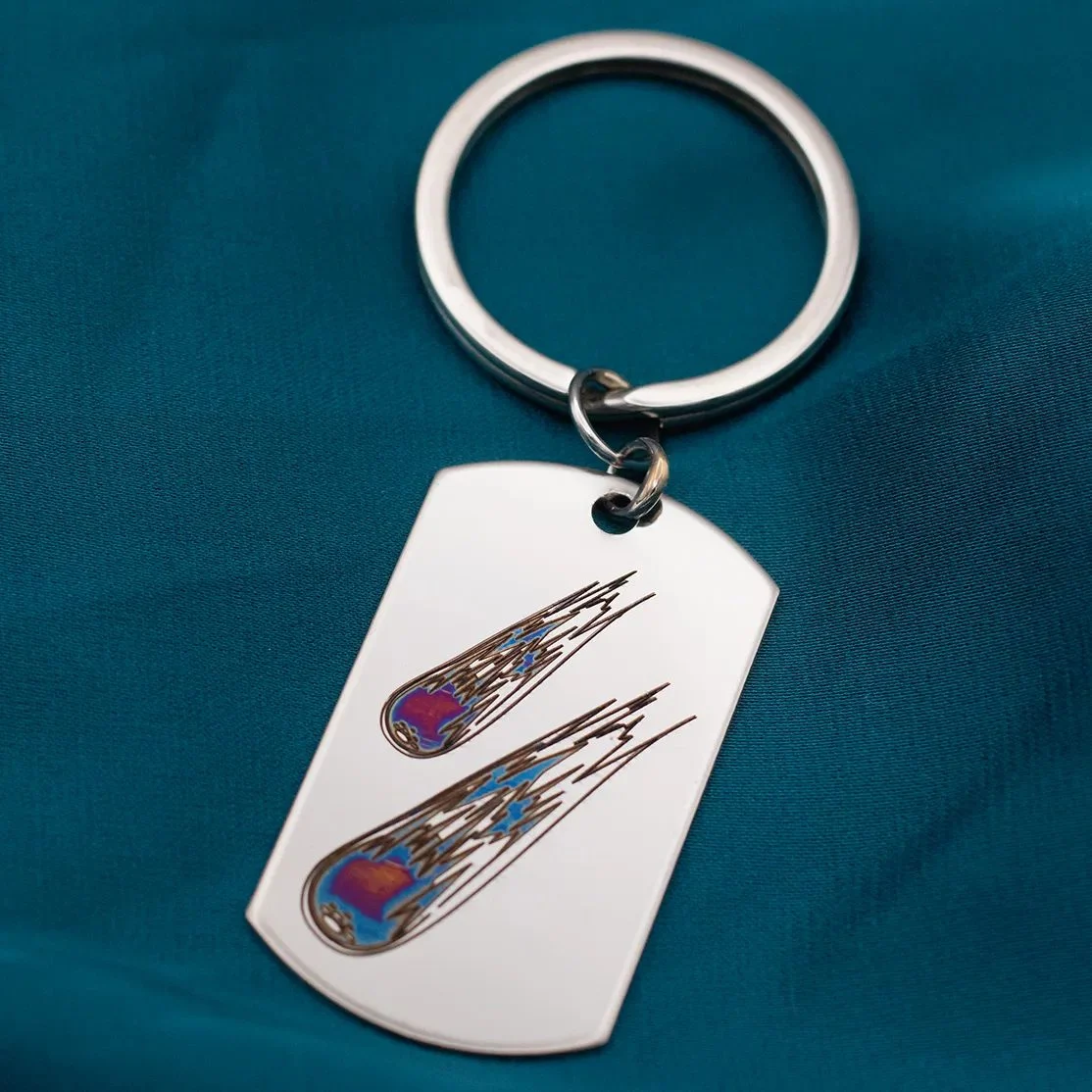 Portachiavi con meteoriti in acciaio inox e colorazione al laser